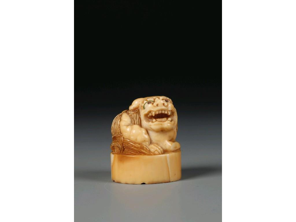 Appraisal: A CHINESE IVORY SEAL with mythical beast top early th