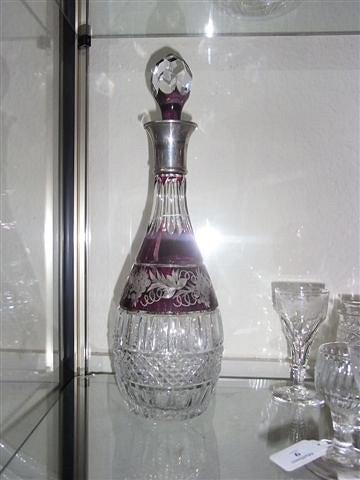 Appraisal: A PAIR OF RUBY AND CLEAR CUT GLASS DECANTERS with