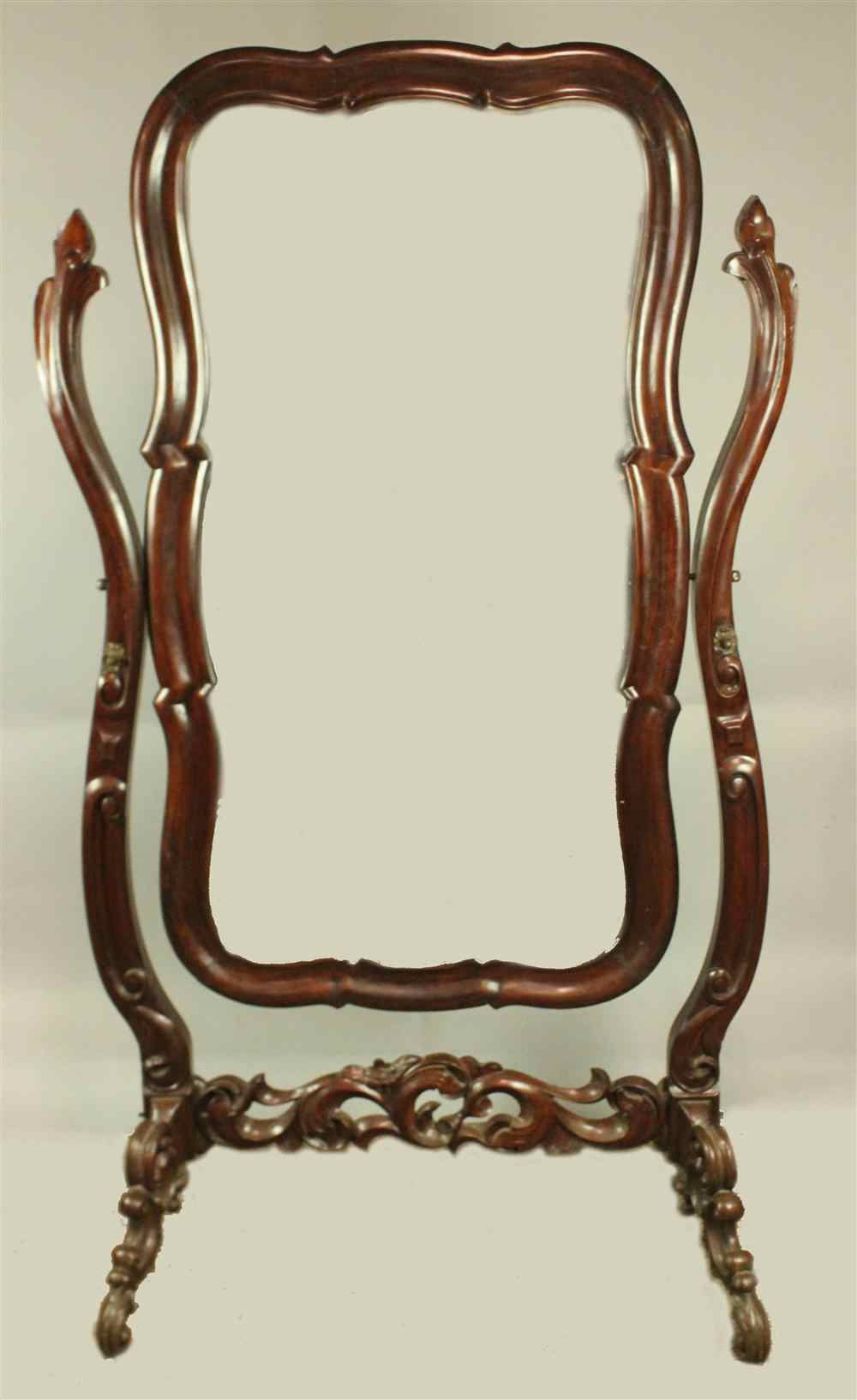 Appraisal: SRI LANKAN COLONIAL HARDWOOD CHEVAL MIRROR ON STAND the rectangular