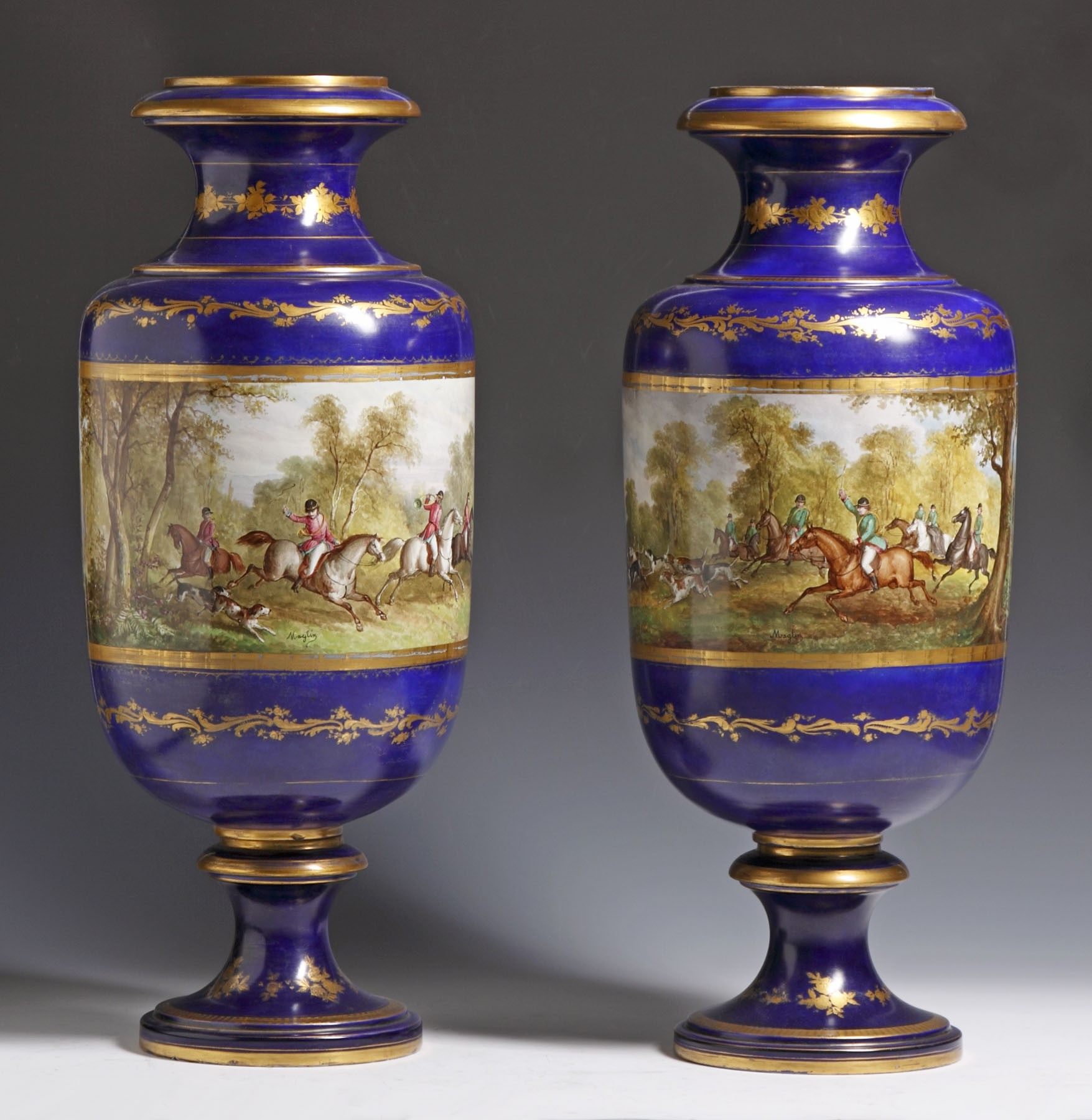 Appraisal: Pair of Sevres Cobalt Vases w Hunting Scenes Artist sgn