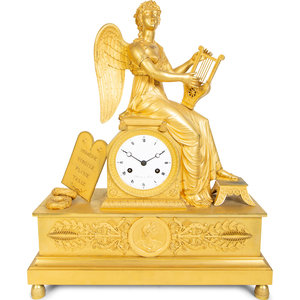 Appraisal: A French Empire Gilt Bronze Figural Clock TH CENTURY depicting