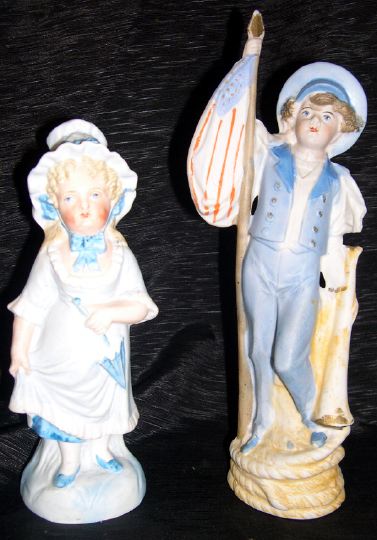 Appraisal: Pair of Pale Blue-and-White German Biscuit Porcelain Cabinet Figures of