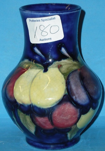 Appraisal: Moorcroft Vase decorated in the Wisteria design height cm crazing