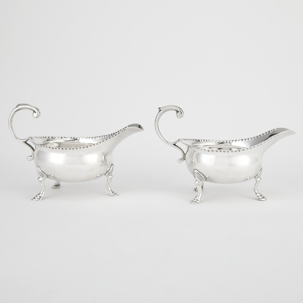 Appraisal: Pair of George III Sterling Silver Sauceboats John Pollock London