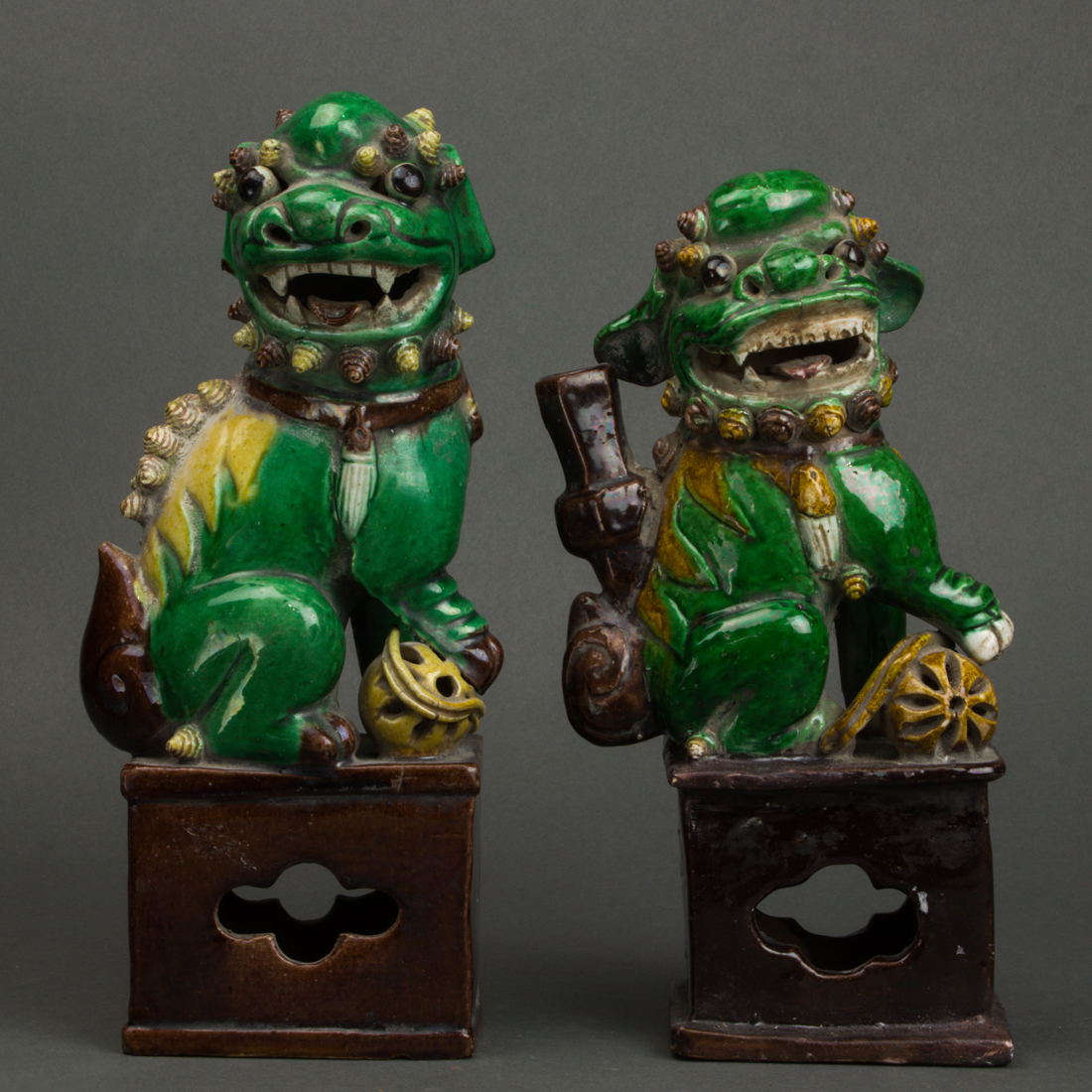 Appraisal: PAIR OF CHINESE FAMILLE VERTE GLAZED FU LIONS Pair of