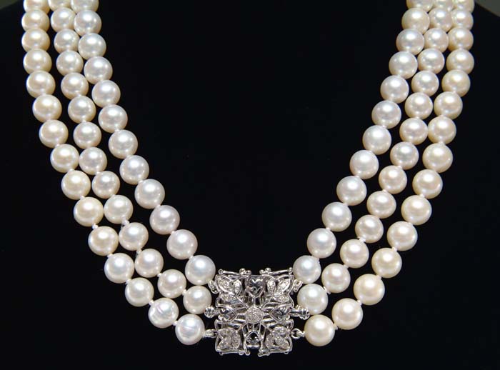 Appraisal: THREE STRAND PEARL NECKLACE Lovely three row nest of cultured