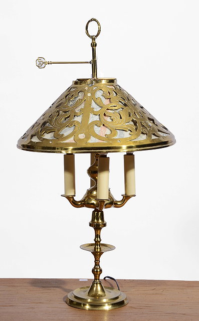 Appraisal: A BRASS FOUR BRANCH READING LAMP with pierced shade wax