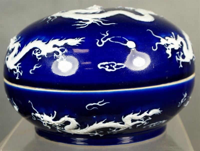 Appraisal: th c Chinese porcelain covered bowl raised biscuit dragons on