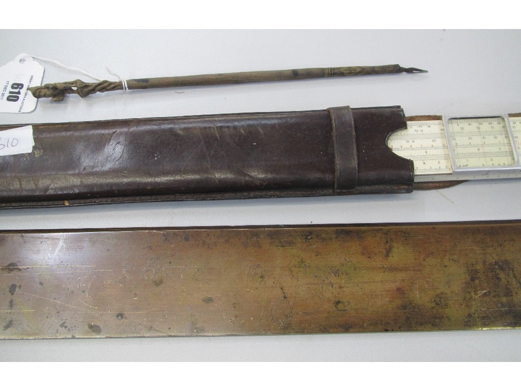 Appraisal: Lot comprising brass straight edge slide rule and quill pen