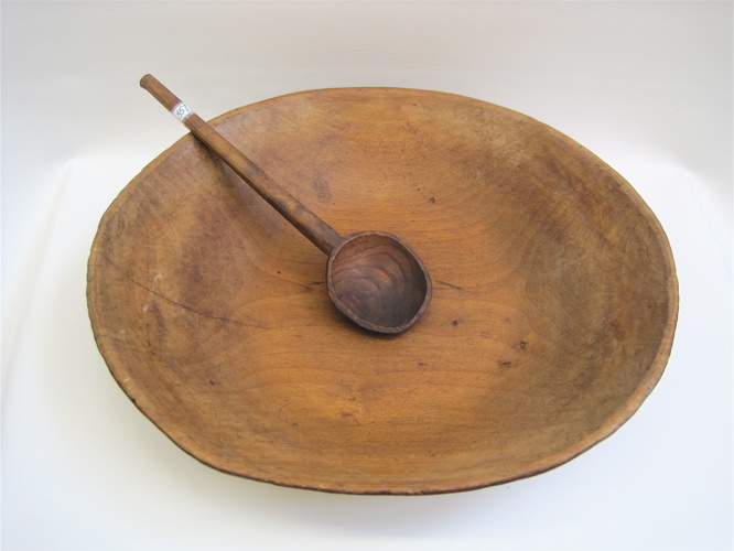 Appraisal: HAND CARVED WOOD DOUGH BOWL SERVING SPOON The bowl L