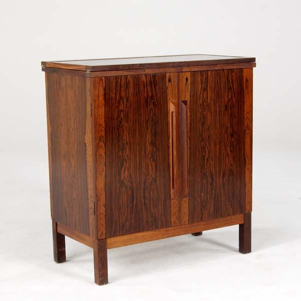 Appraisal: BRUSKBO Rosewood bar cabinet with black laminate top and interior