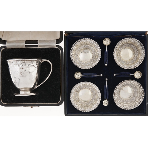 Appraisal: A set of four Victorian die stamped silver salt cellars