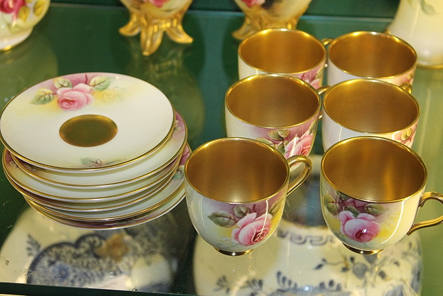 Appraisal: A SET OF SIX ROYAL WORCESTER COFFEE CUPS and saucers