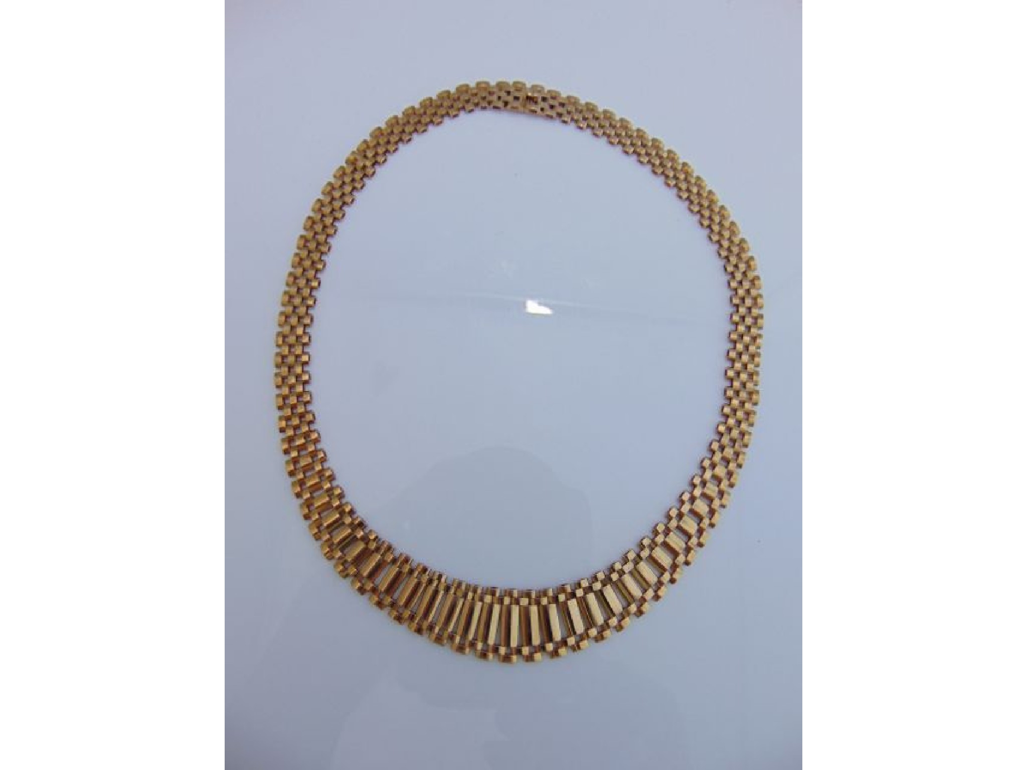 Appraisal: A ct gold collar necklace composed of brick-links g