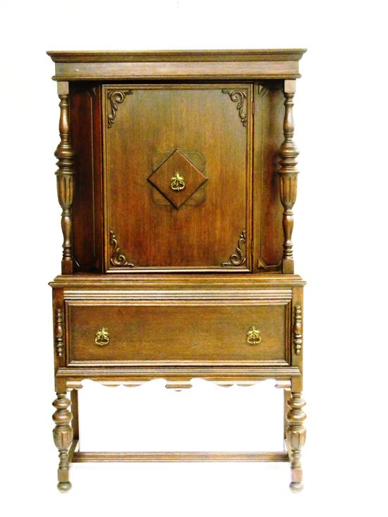 Appraisal: th C Jacobean style walnut veneered linen cabinet a rectangular