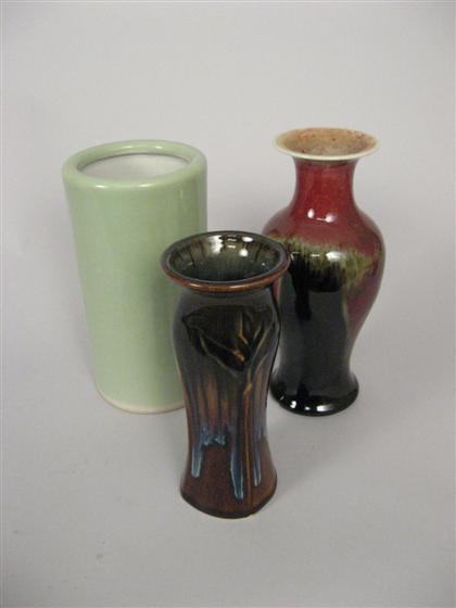 Appraisal: Three pieces of pottery th century Tall cylindrical vase with