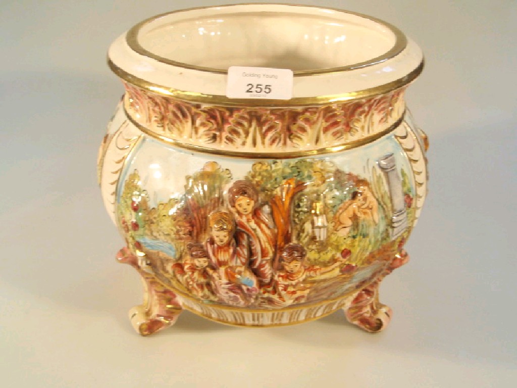 Appraisal: A Capo de Monte relief moulded jardiniere raised on three