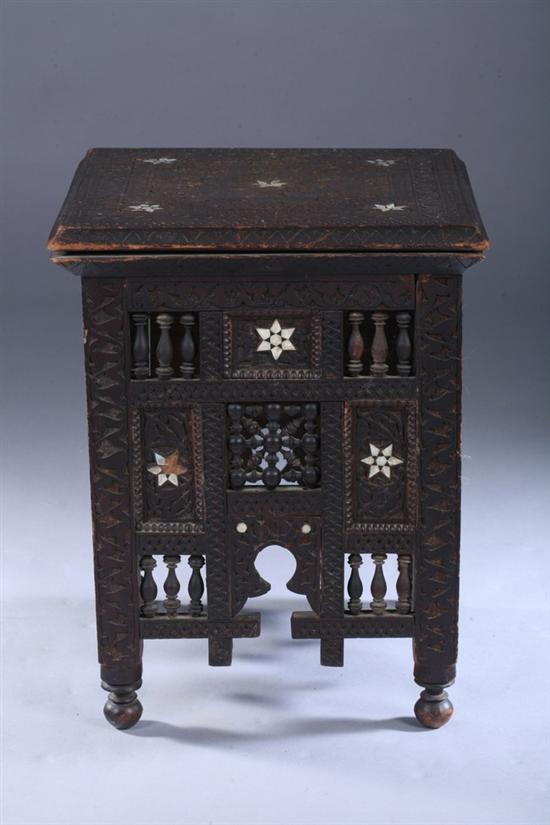 Appraisal: MOROCCAN MOTHER-OF-PEARL INLAID WOOD SIDE TABLE The top carved with