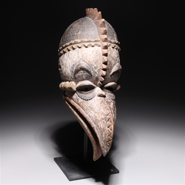 Appraisal: West African tribal beak mask with carved designs with custom