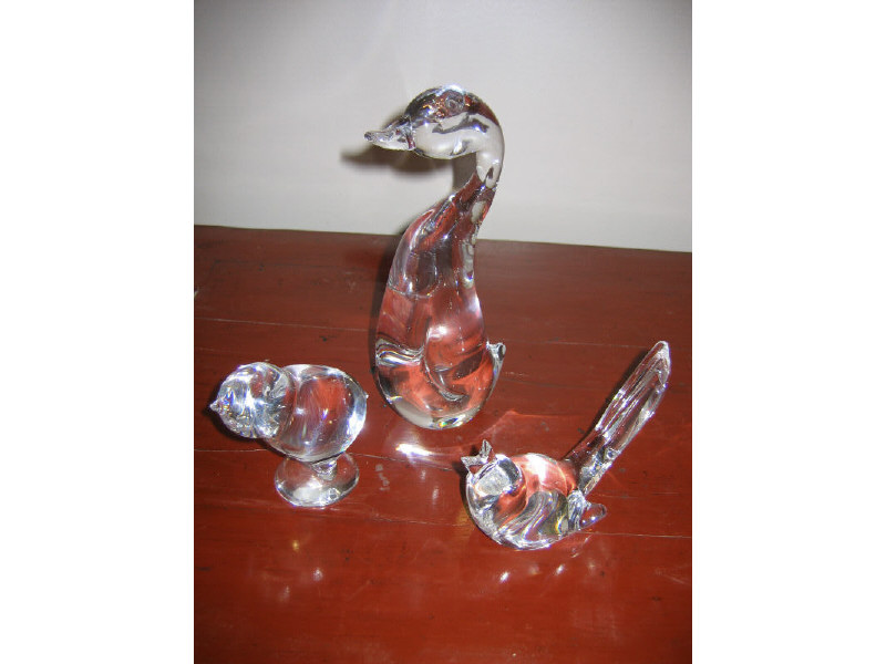 Appraisal: THREE STEUBEN CRYSTAL ANIMAL FIGURES Lloyd Atkins Duckling designed in