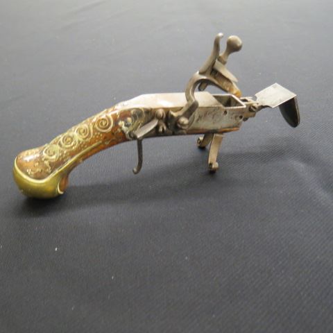 Appraisal: Early Pistol Made into a Kindling Lighter with flint inlaid