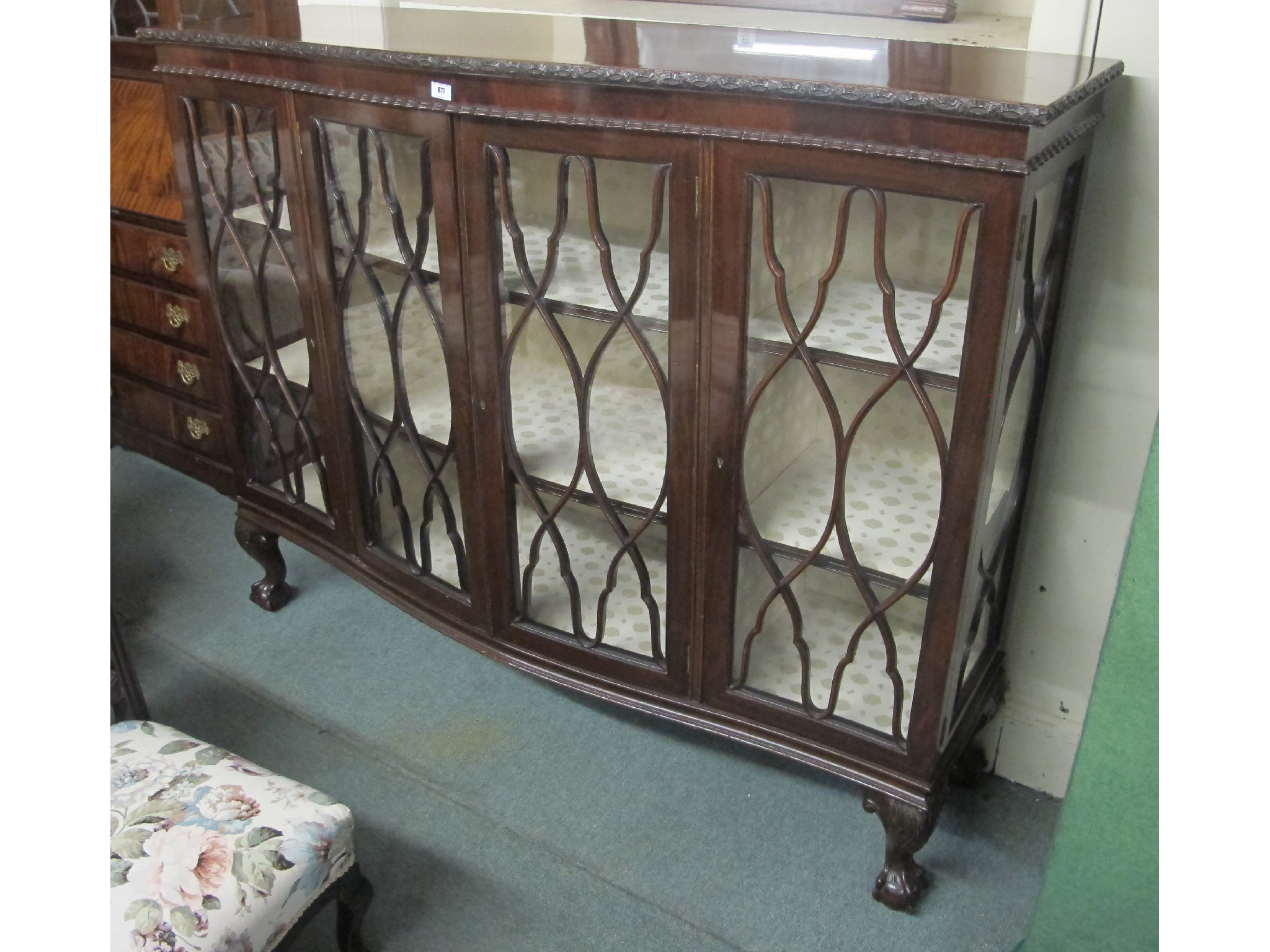 Appraisal: Mahogany glazed four door display cabinet on ball and claw