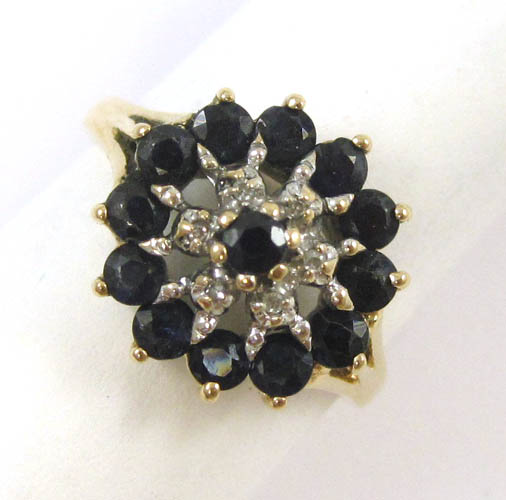 Appraisal: SAPPHIRE DIAMOND AND FOURTEEN KARAT GOLD RING set with six