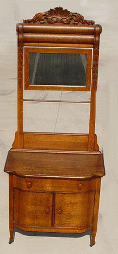 Appraisal: LATE VICTORIAN GOLDEN OAK WASH STAND WITH MIRROR Tall eye