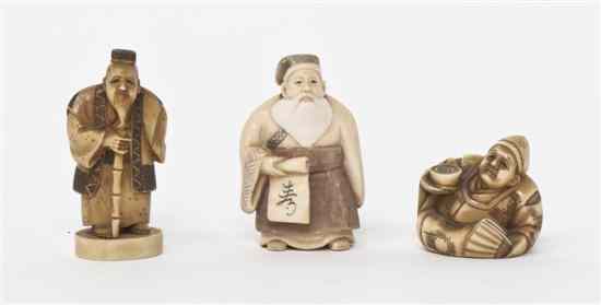 Appraisal: Two Carved Ivory Netsuke comprising a standing immortal holding a