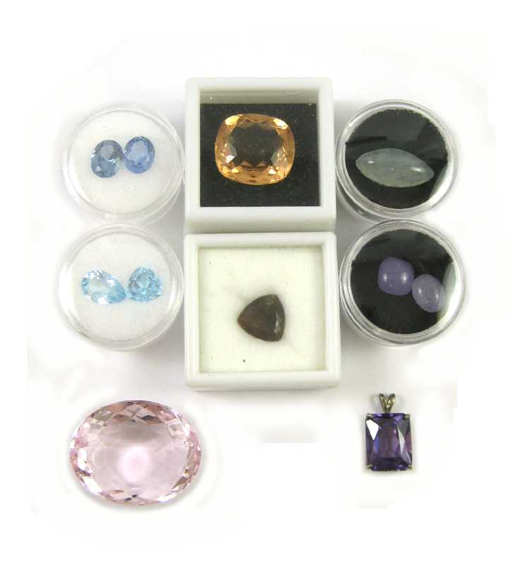 Appraisal: COLLECTION UNSET GEMSTONES AND A PENDANT including a silver pendant