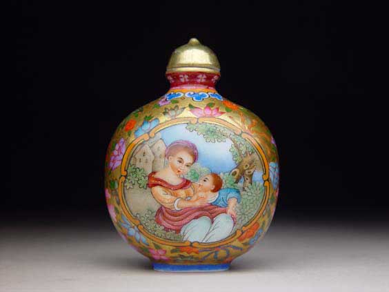 Appraisal: ENAMELED PORCELAIN SNUFF BOTTLE Beautifully Famille Rose enameled and gilt