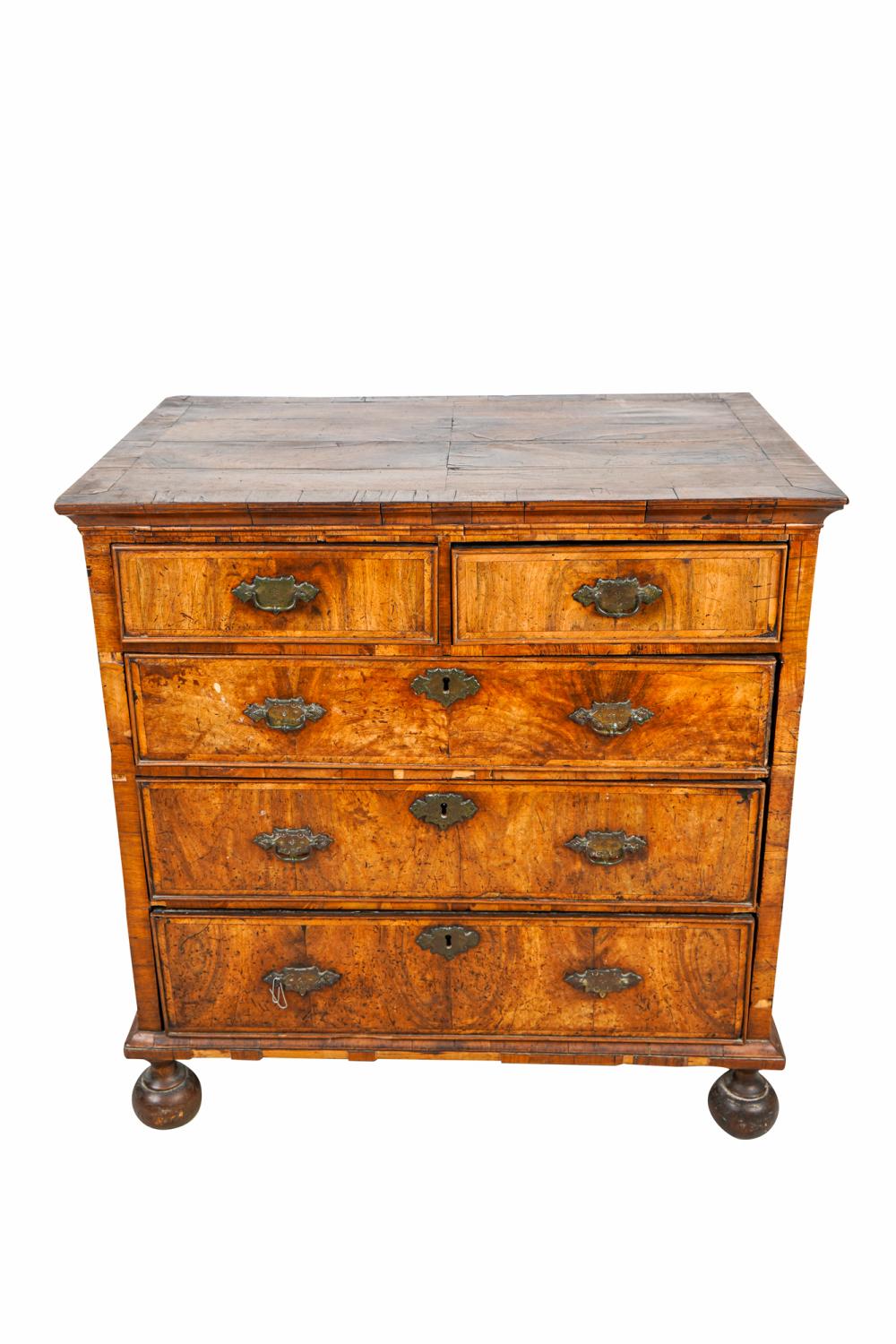 Appraisal: GERMAN BAROQUE WALNUT CHEST OF DRAWERS th century the cross-banded