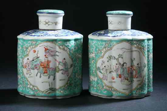 Appraisal: PAIR CHINESE FAMILLE ROSE PORCELAIN TEA CADDIES Figural decoration -