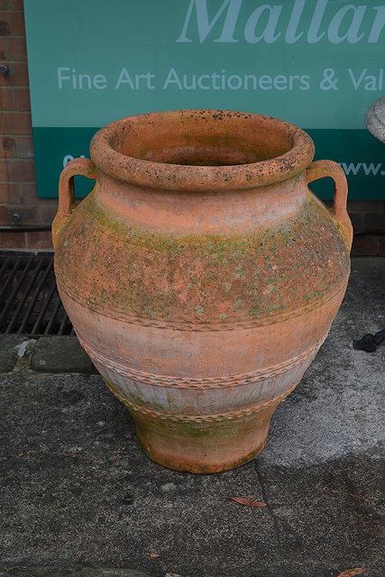 Appraisal: A Large terracotta porthoi potwith double loop handles cm high