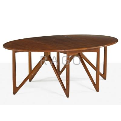 Appraisal: KURT OSTERVIG Teak drop-leaf dining table Condition Report