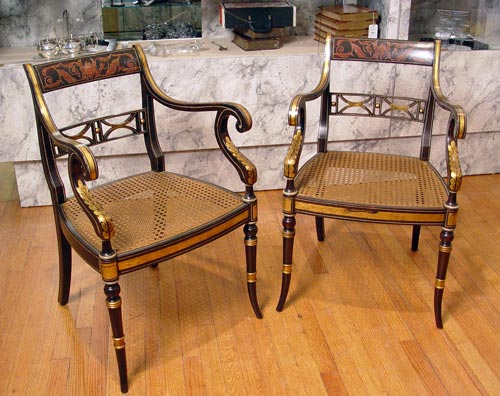 Appraisal: PAIR REGENCY STYLE SCROLL ARM CHAIRS Grain painted gold and