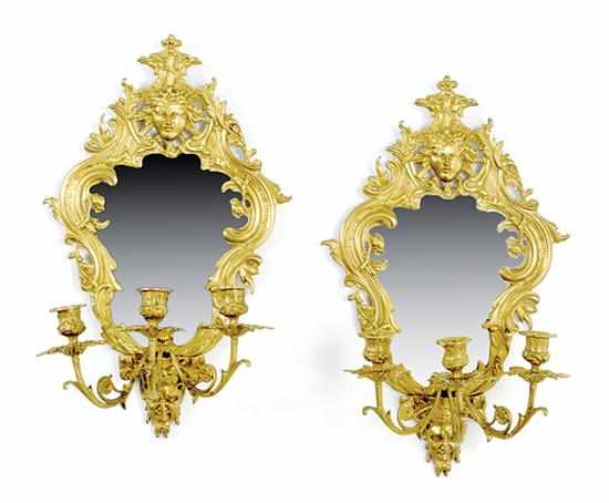 Appraisal: Pair French brass three-light sconces mirrored backplate bound within cartouche