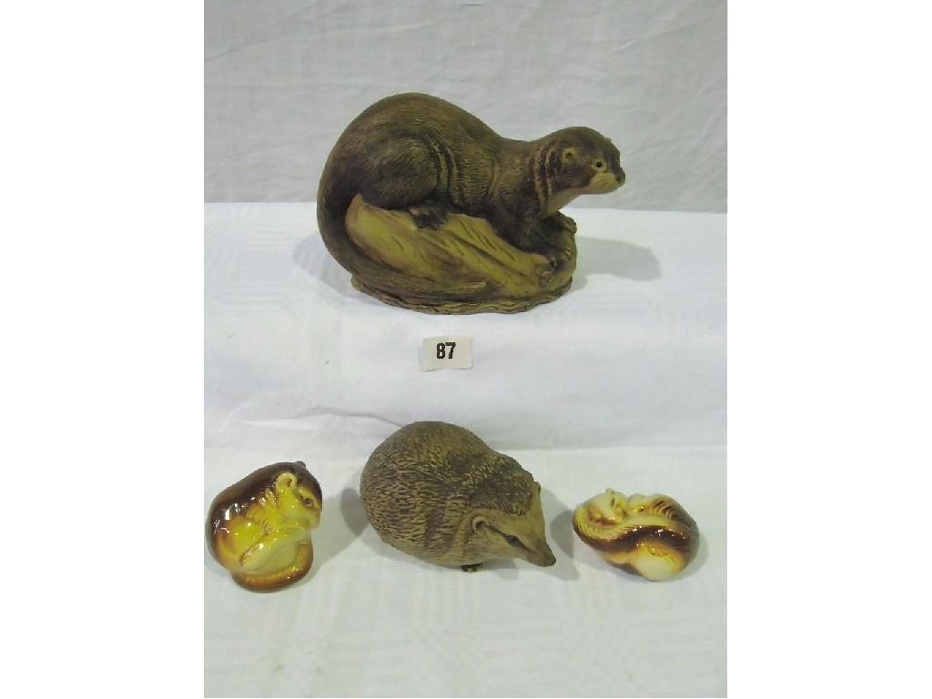 Appraisal: A Poole Pottery stoneware model of an otter and a