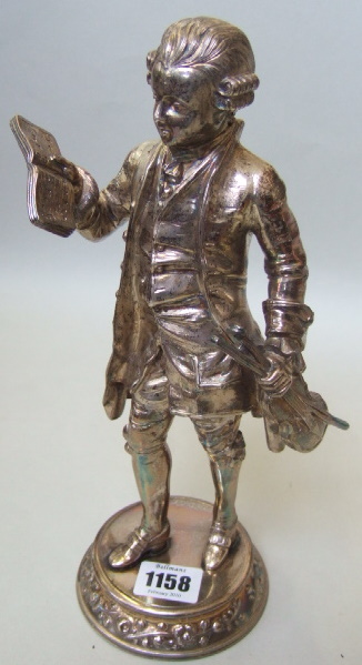 Appraisal: A silver figure of J S Bach standing holding a