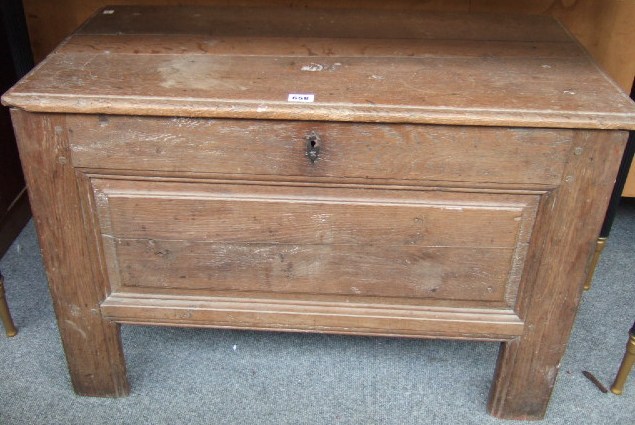 Appraisal: An th century French oak coffer the plank top over