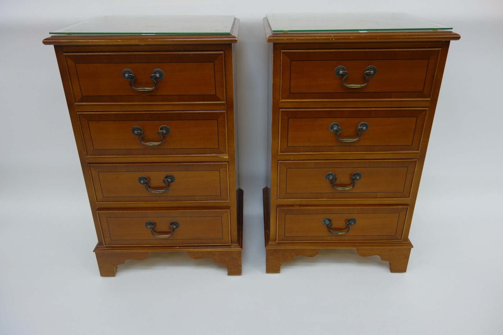 Appraisal: A pair of reproduction George III style mahogany and crossbanded