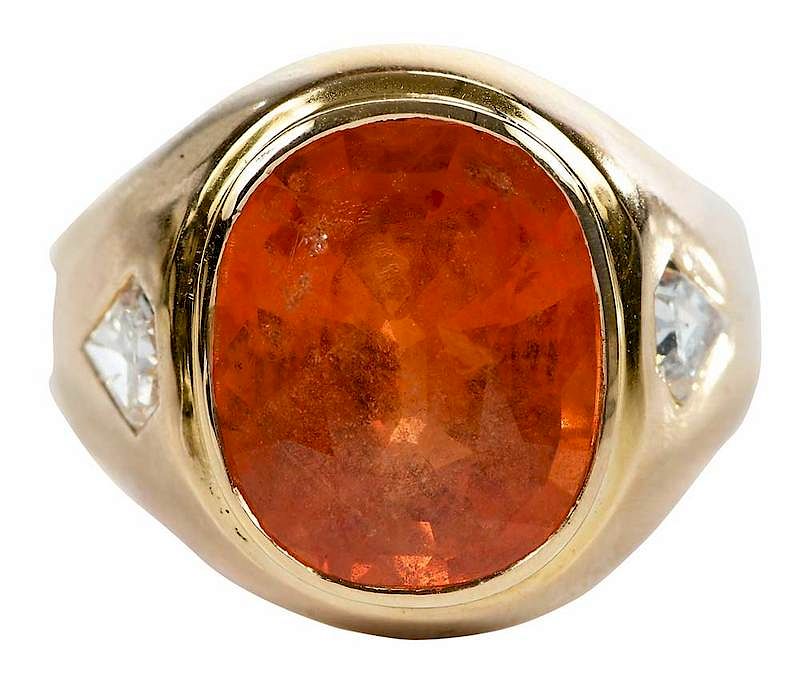 Appraisal: kt Sapphire and Diamond Ring center oval faceted orange sapphire