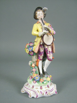 Appraisal: A th century Derby figure of a gentleman in th