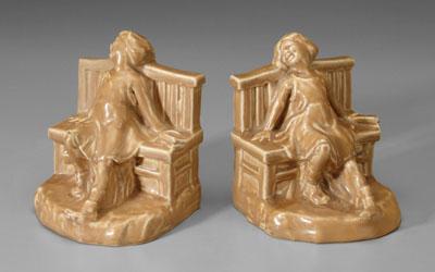 Appraisal: Pair Rookwood bookends girls seated on benches light brown glaze