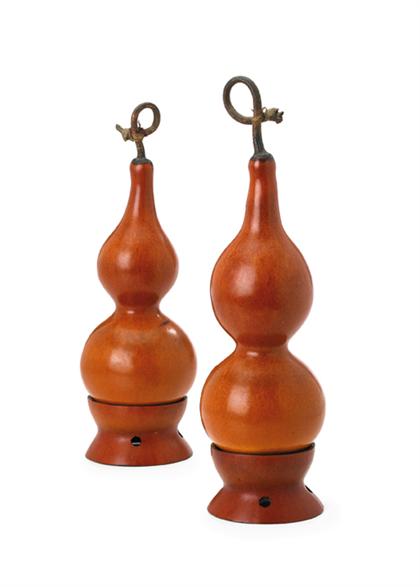 Appraisal: Fine pair of Chinese natural double form gourds on sectional