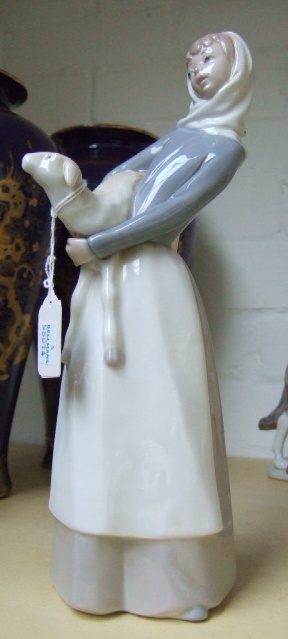 Appraisal: A Lladro figure of a lady holding a lamb