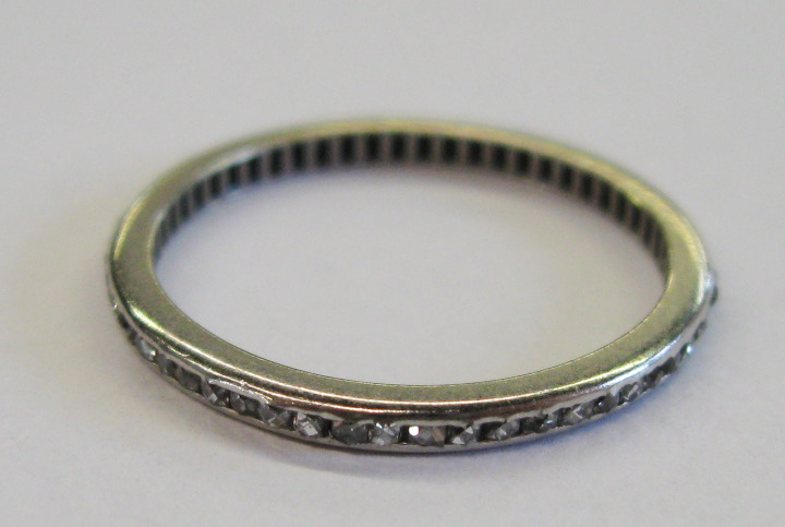 Appraisal: American Platinum and Diamond Eternity Band the platinum frame channel