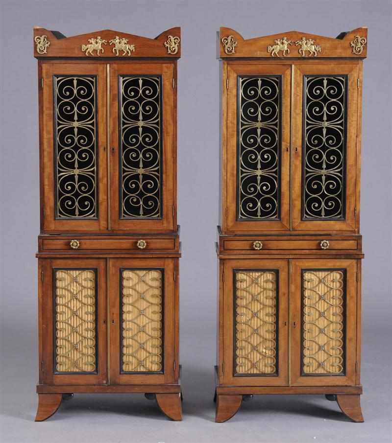 Appraisal: PAIR OF REGENCY BRASS-MOUNTED MAHOGANY BOOKCASES Each pediment with centaur