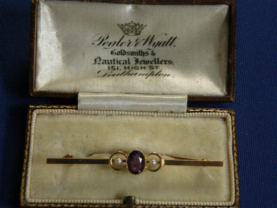 Appraisal: Amethyst and pearl brooch stamped ct