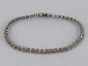 Appraisal: A carat white gold diamond line bracelet estimated total diamond